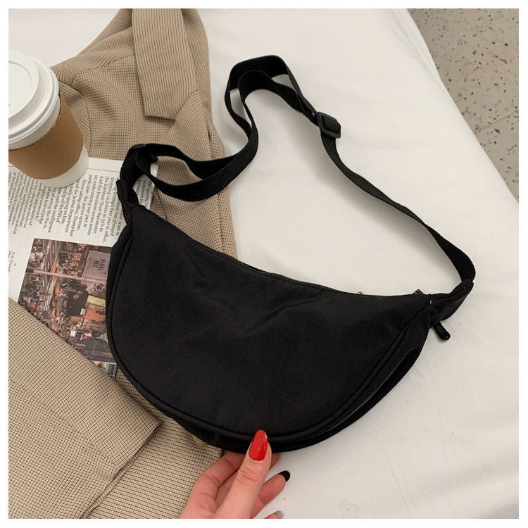 Minimalist Dumpling Messenger Bag