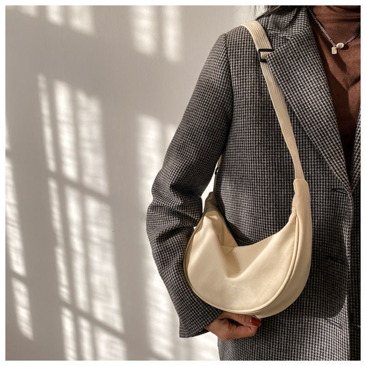 Minimalist Dumpling Messenger Bag