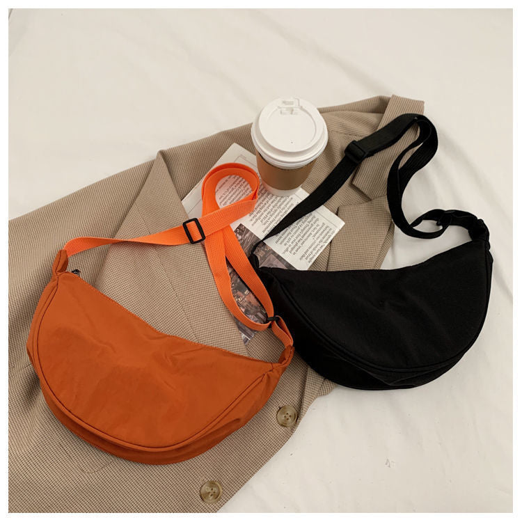 Minimalist Dumpling Messenger Bag