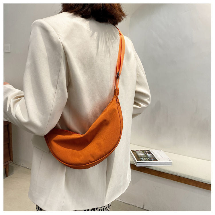 Minimalist Dumpling Messenger Bag