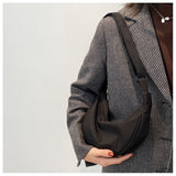 Minimalist Dumpling Messenger Bag