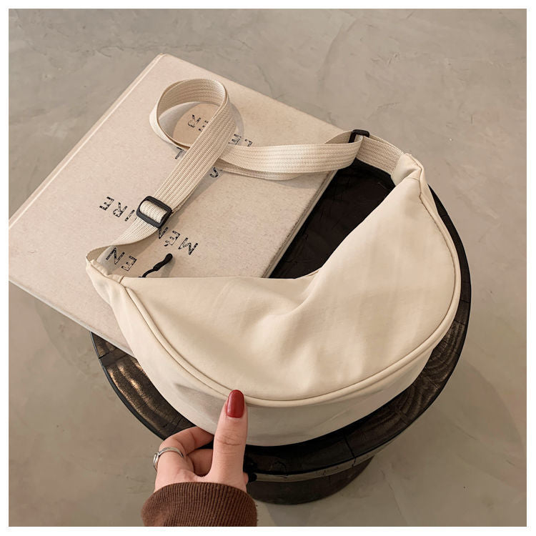 Minimalist Dumpling Messenger Bag